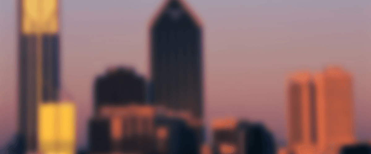 Skrill Network - blurred city skyline banner background